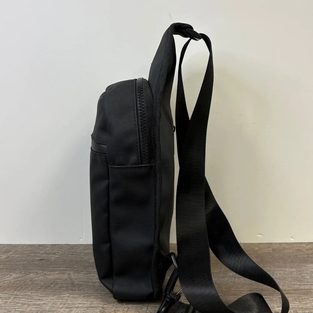 True Religion “Jody” Sling Bag | Black Logo Lined Crossbody